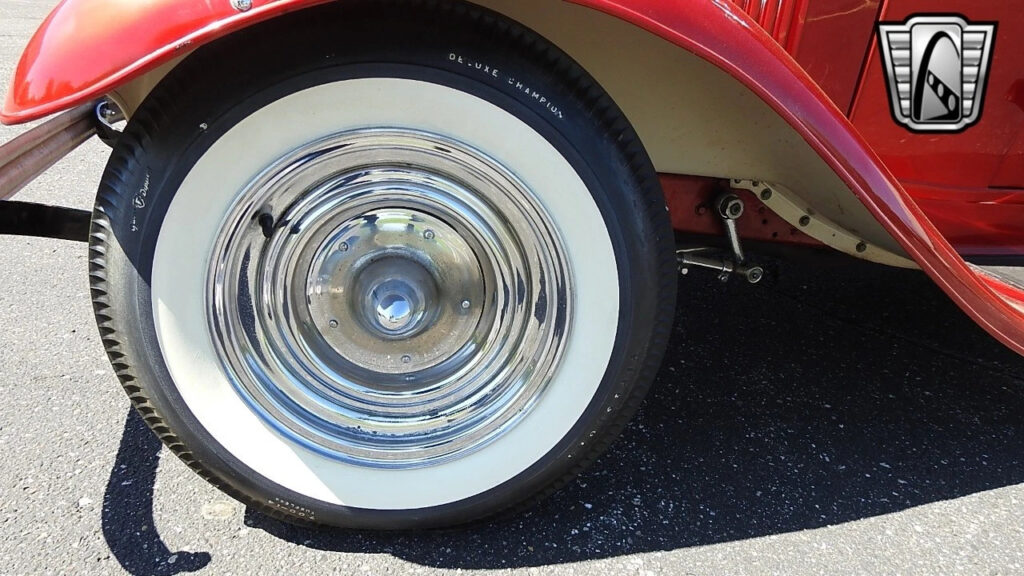 red 1932 Ford Roadster 301 Chevy with a Blower V8 3 Speed Manual